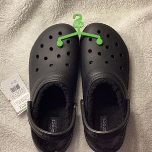 CROCS Black NWT  Sz 10 mens.  Sz 12 womens